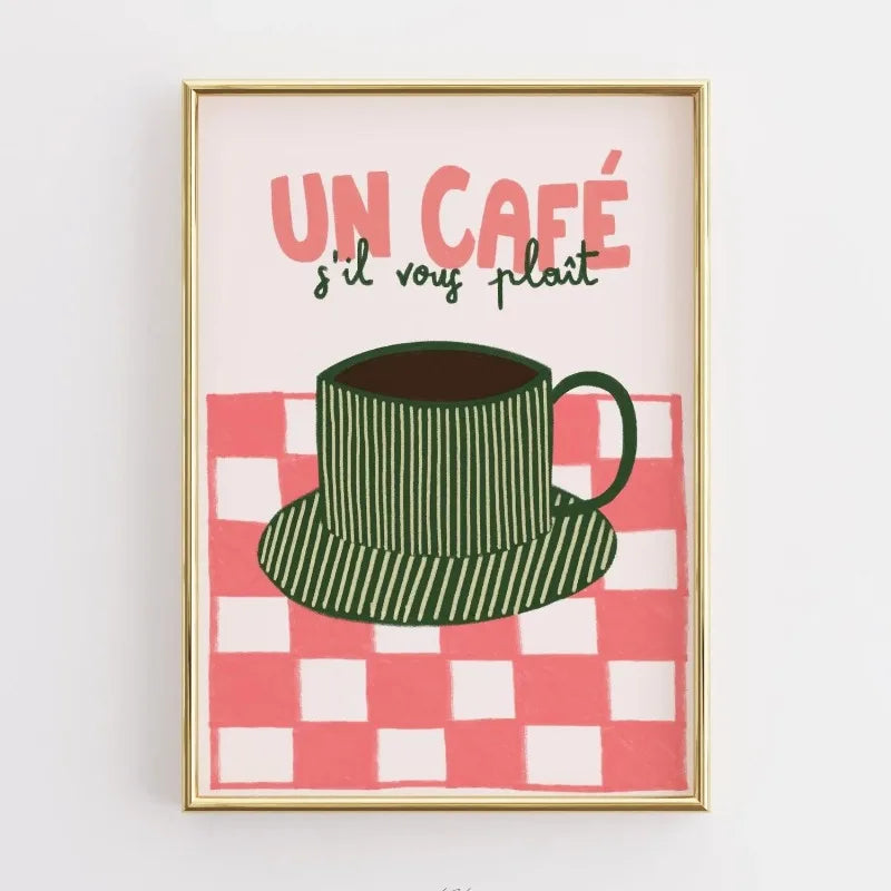 Framed artwork with a green coffee cup on a red and white checkered background and text 'UN CAFé s'il vous plaçt'.