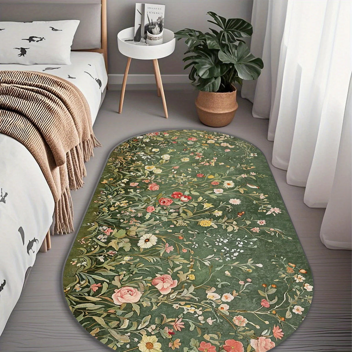 Floral patterned rug in a bedroom setting with a bed, side table, and plant.
