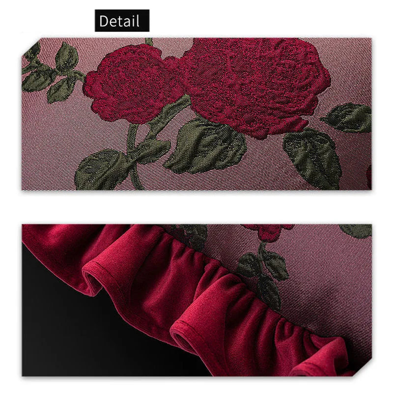 Close-up of floral embroidery on fabric with a focus on texture and design.