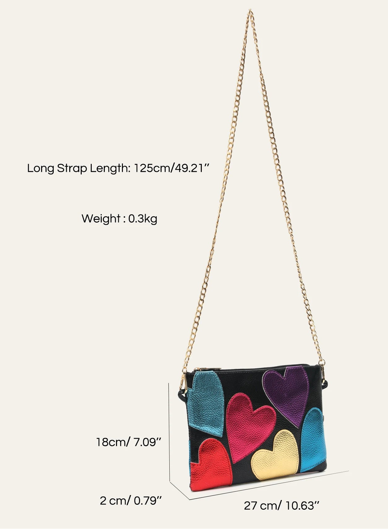 Black handbag with colorful heart designs on a white background