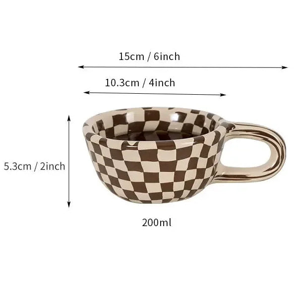Checkered ceramic cup with measurements on a white background