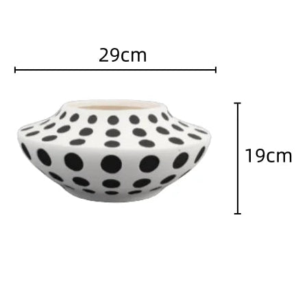 Two ceramic vases with measurements on a white background