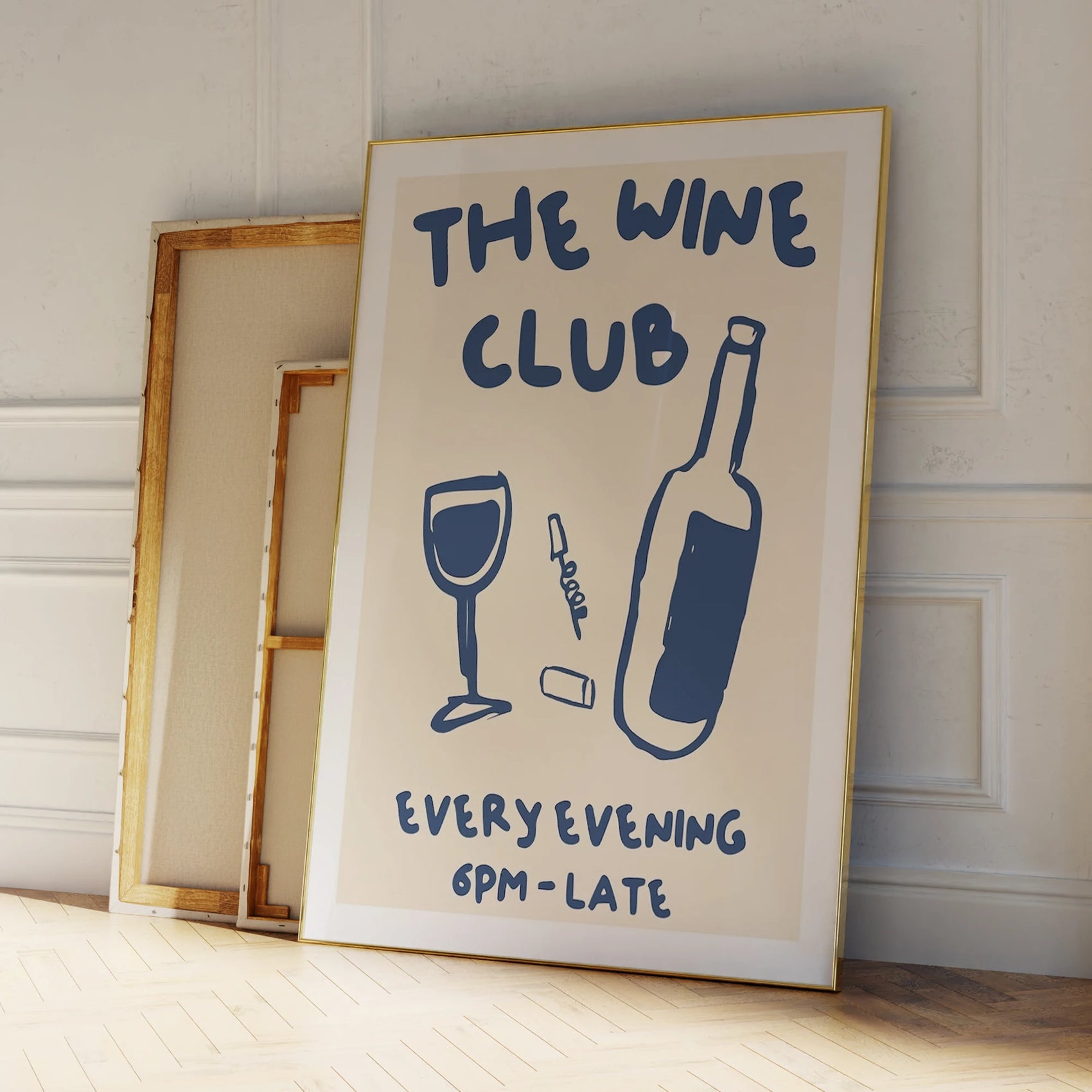 Framed poster with 'The Wine Club' text and wine graphics on a wooden floor.