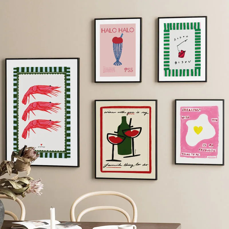 Wall with framed artwork featuring colorful designs and text