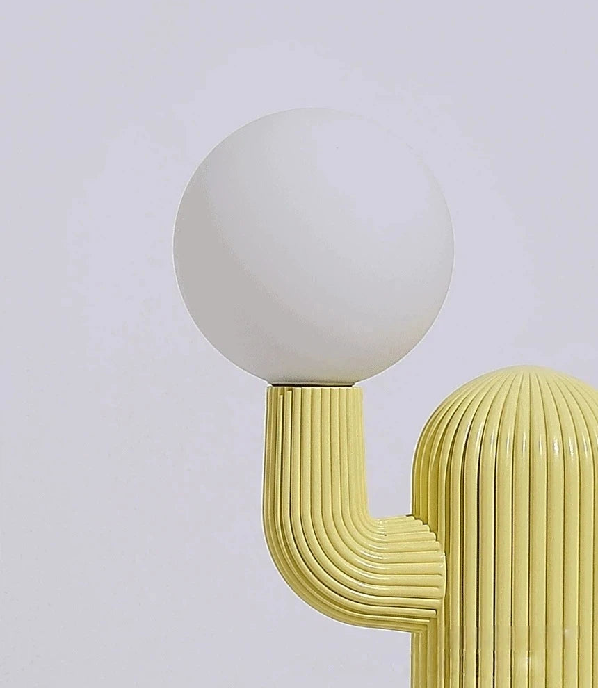 Modern lamp with a white shade and yellow base on a light gray background