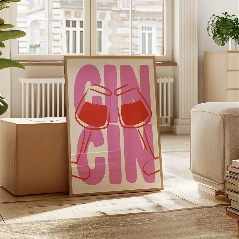 Framed artwork with 'GIN GIN' text and red drink glasses in a living room setting.