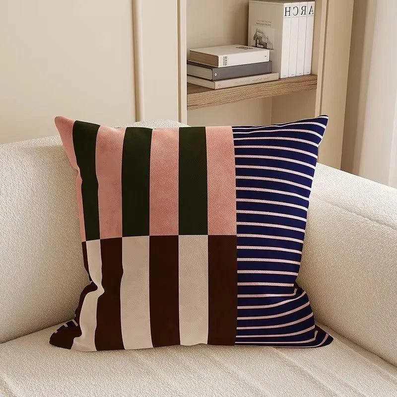Decorative pillow with geometric pattern on a couch