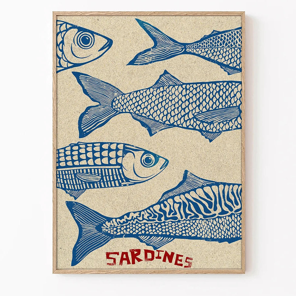 Framed artwork with blue sardine illustrations on a beige background