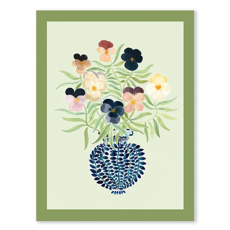Framed artwork of a blue vase with flowers on a light green background