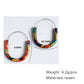 Colorful hoop earrings with measurements and material information on a white background