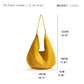 Yellow handbag with measurements on a white background