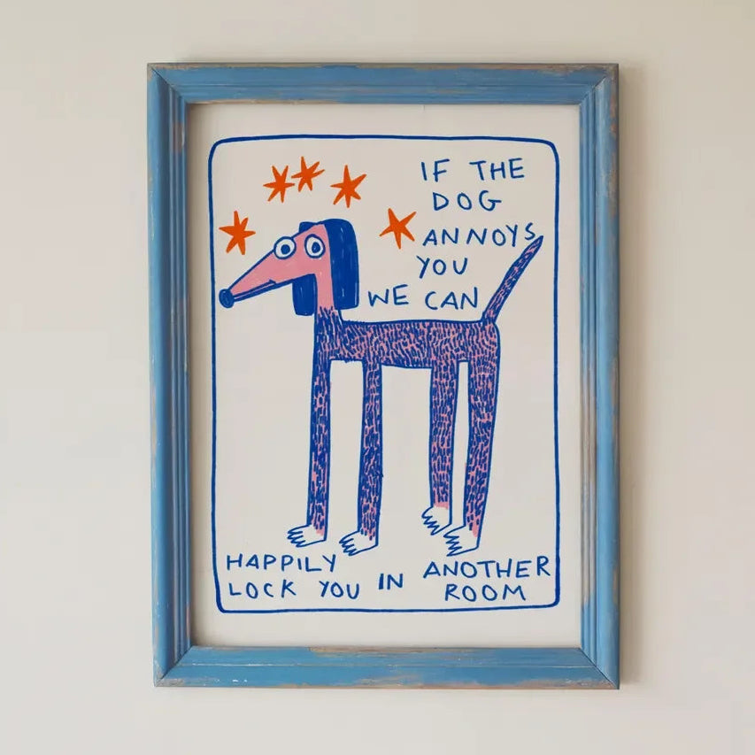 Framed illustration of a dog with text on a white wall