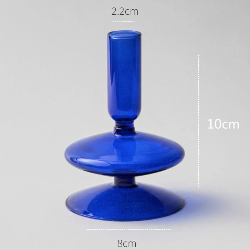 Blue glass object with measurements on a gray background