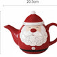 Red teapot with Santa Claus design and measurements on a white background