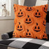 Orange pillow with black jack-o&
