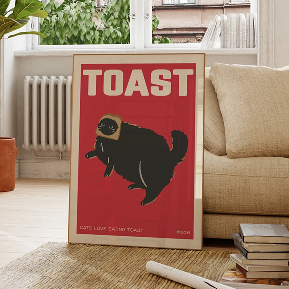 Framed poster with a cat eating toast design in a living room setting.