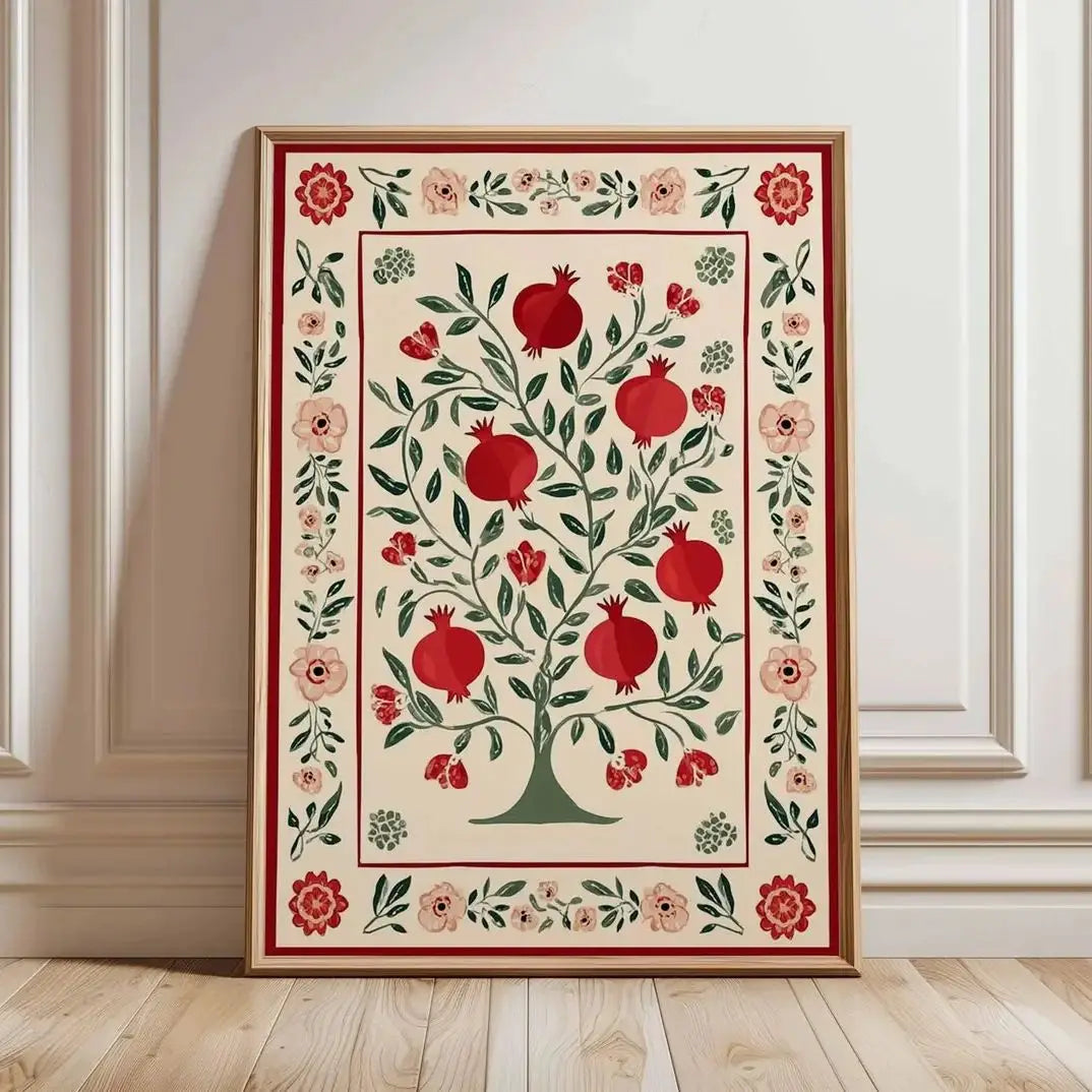 Decorative rug with pomegranate and floral design on a wooden floor.
