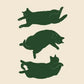 Three green cats in various poses on a beige background