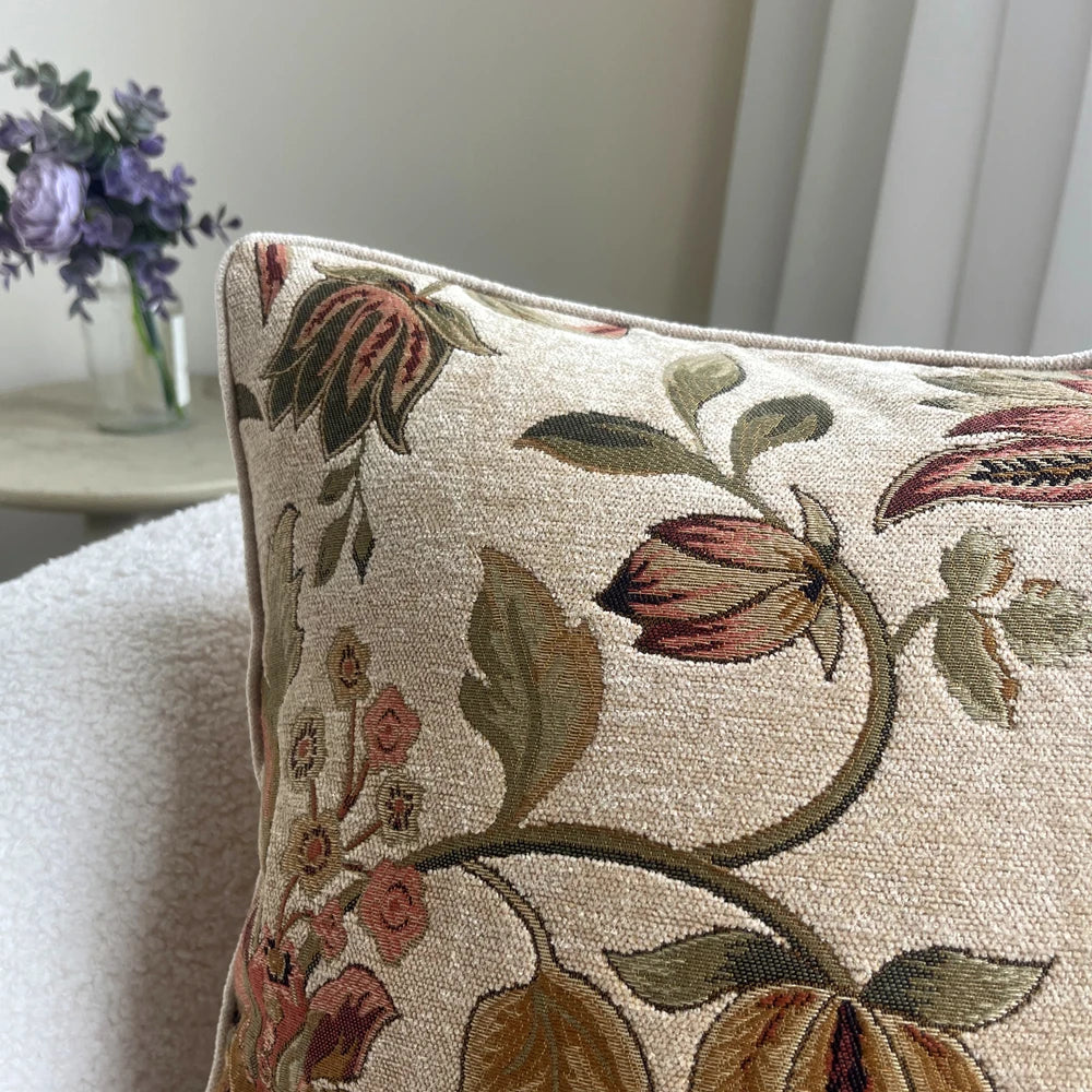 Decorative pillow with floral pattern on a neutral background