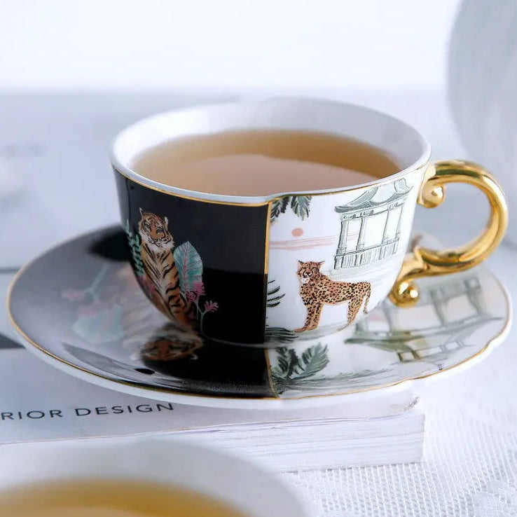 Teacup with animal design on a saucer with a blurred background