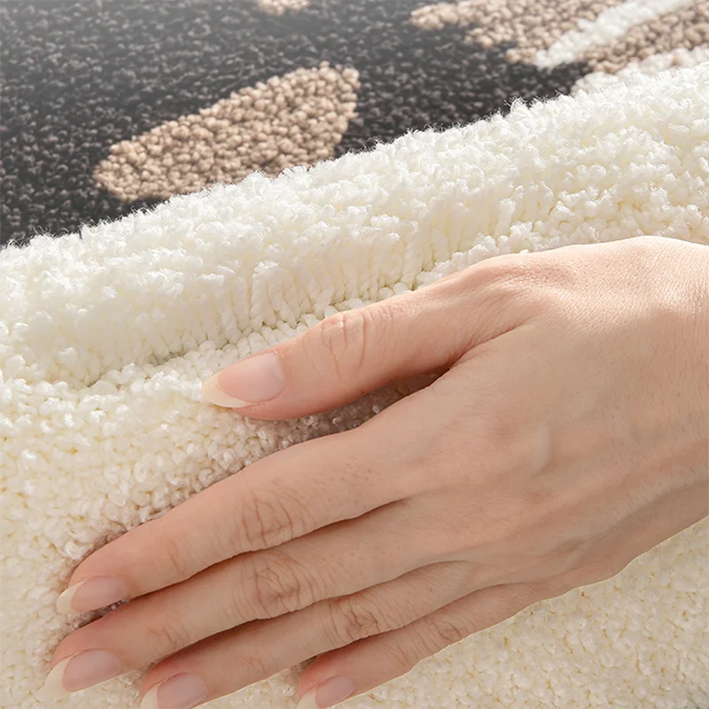 black cat shaped bath mat styled product view
