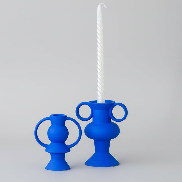 blue double handle vase circular ceramic flower vessel styled product view