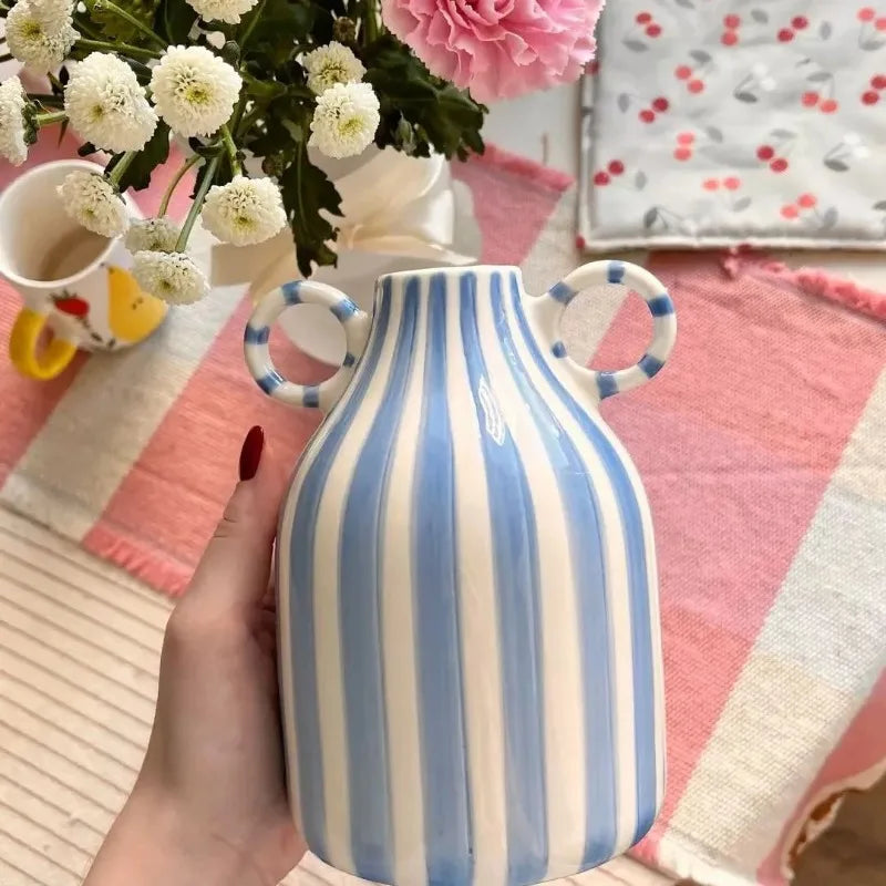 blue white striped ceramic cylinder vase styled product view