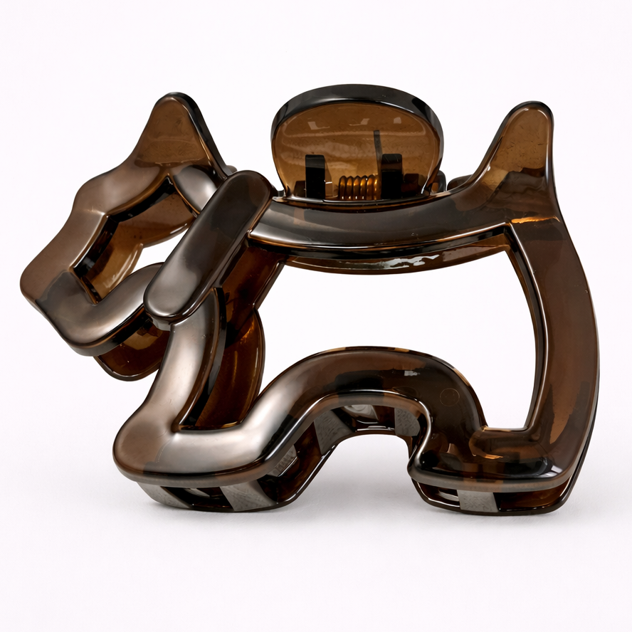 Brown glass sculpture on a white background
