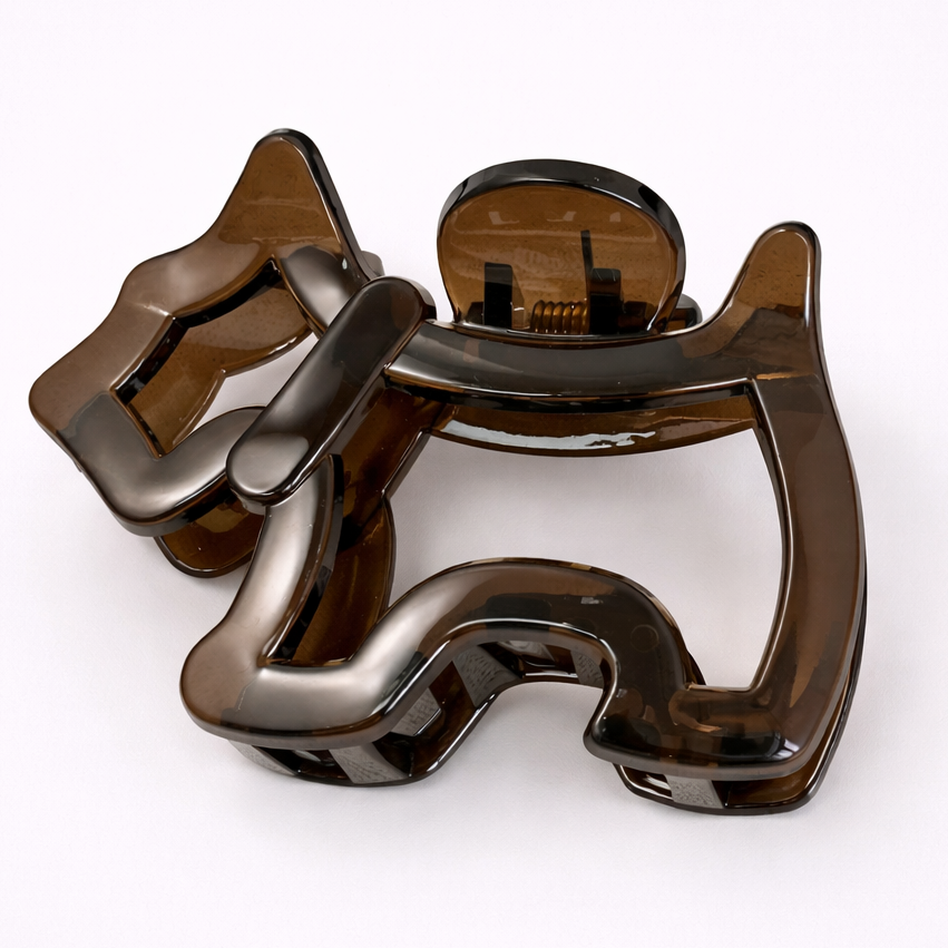 Brown hair clip on a white background