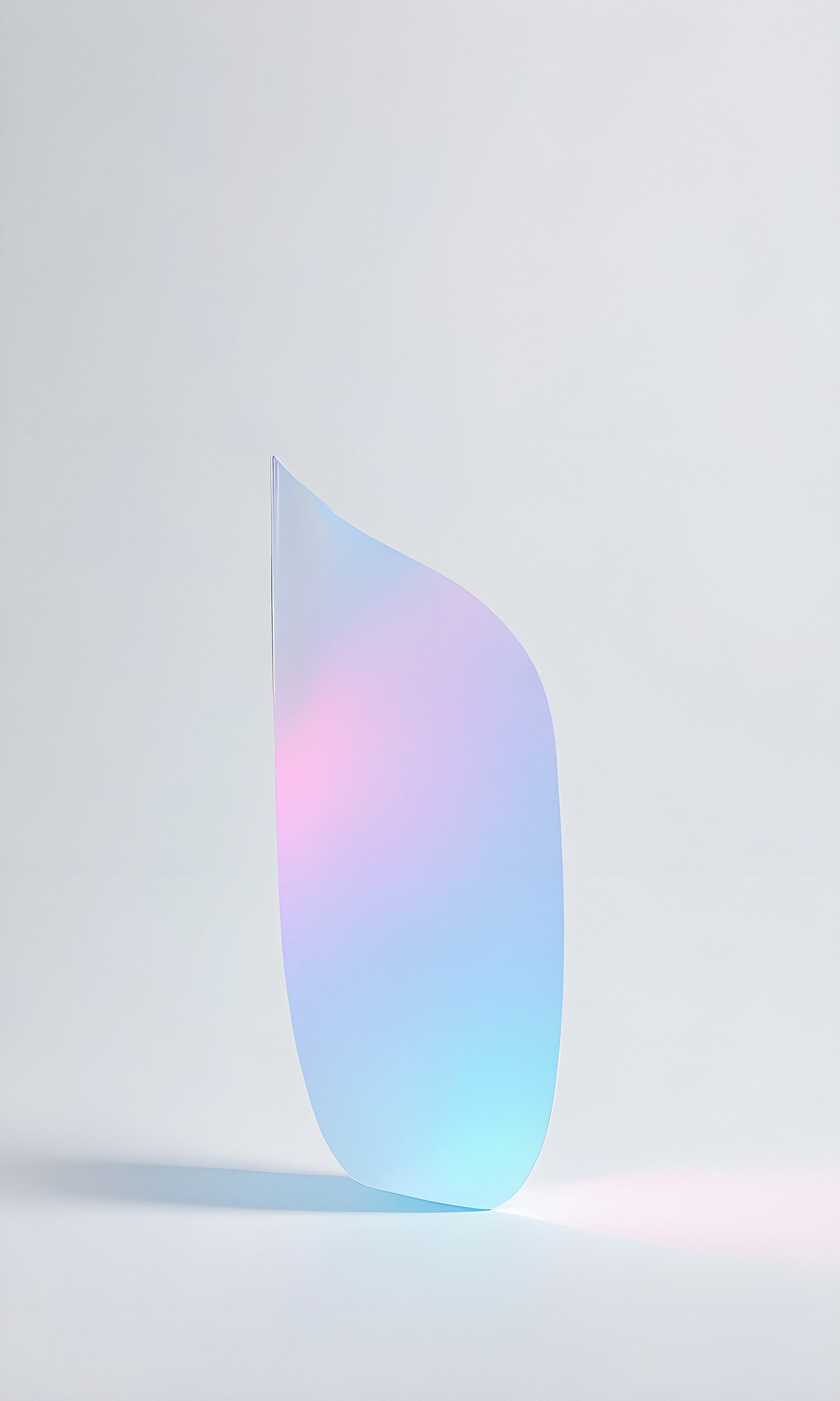 A delicate, colorful translucent sheet stands upright against a white background, reflecting soft light during a serene afternoon