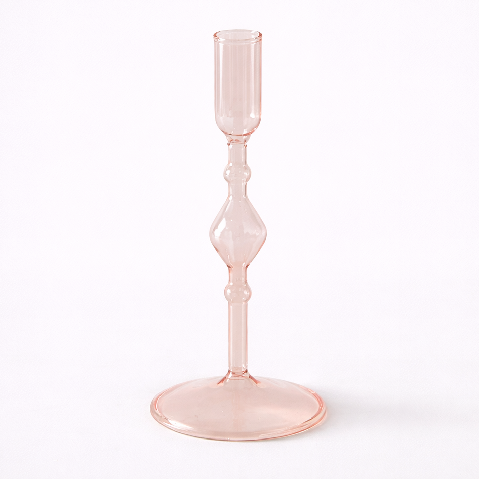 Clear glass hourglass on a white background