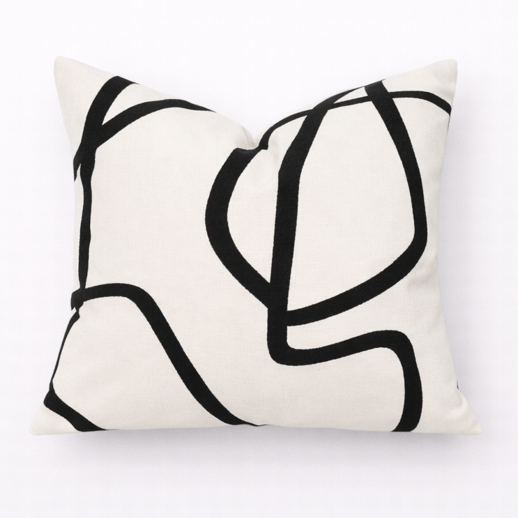Cream cushion cover with bold black abstract line design in 45 x 45cm square format