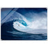 Surfer riding dramatic blue ocean wave 