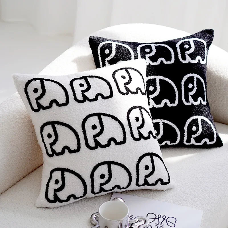 Monochrome wildlife cushion cover with elephant motif for bedroom styling