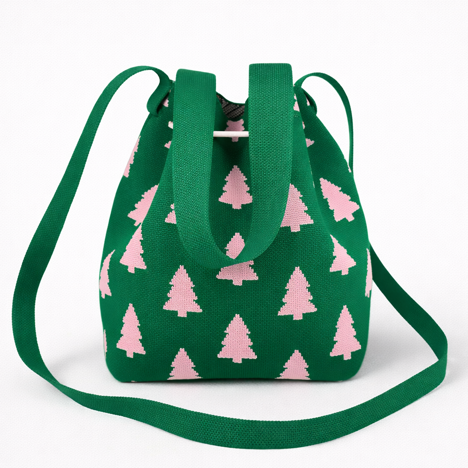 Green bag with pink tree pattern on a white background