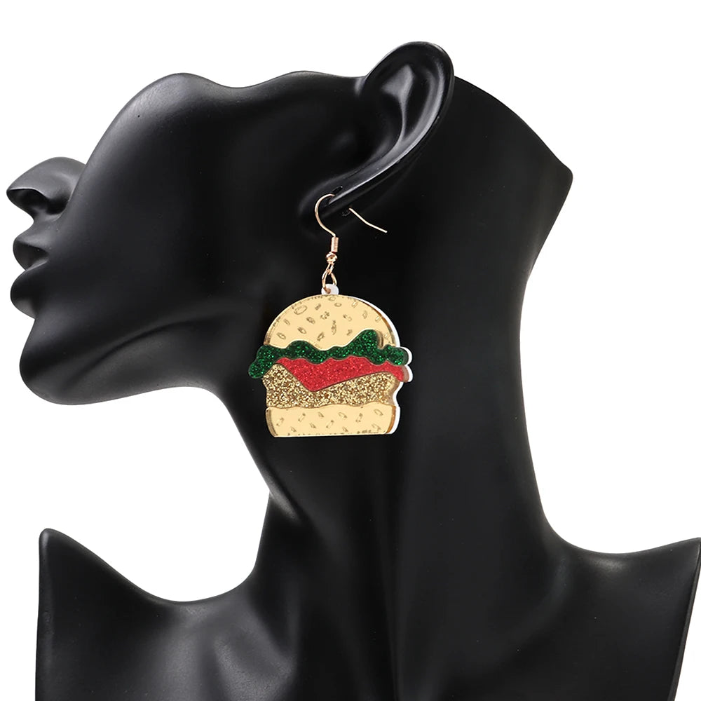 Burger-shaped earrings on a mannequin ear