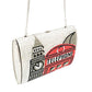Designer handbag with London-themed design on a white background