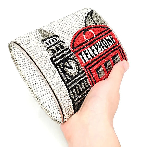 Hand holding a rhinestone-embellished clutch with a red telephone box design - alternate view 8