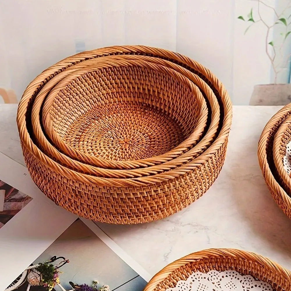 Set of woven baskets on a light surface with a blurred background