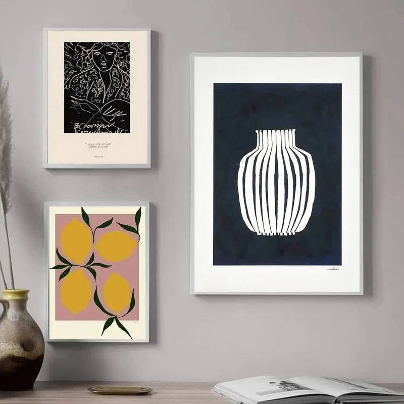 Navy striped pottery artwork styled in a modern gallery wall interior