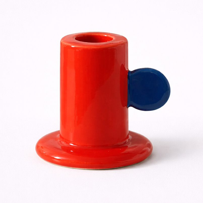 red blue ceramic candle holder round handle color block decor dining table main product view