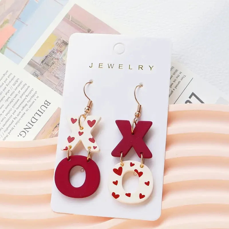 red heart xo dangle earrings acrylic love jewelry detail product view