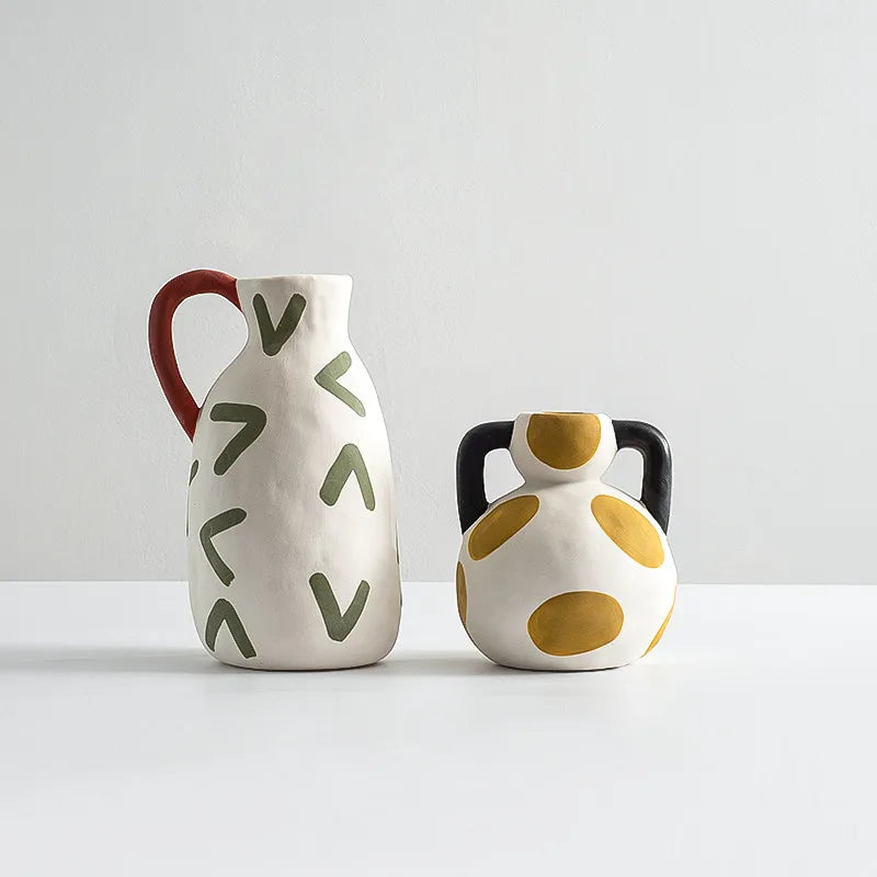 yellow polka dot ceramic vase black handles styled product view